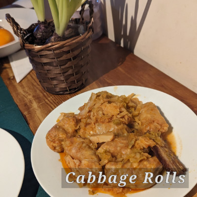 a plate with cabage rolls dish